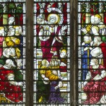 north stained glass window showing detail of jesus speaking to crowd