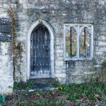 old wooden arched side door
