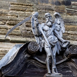 bearded angel of death with scythe