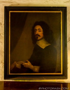 17th century painting of protestant priest holding a book