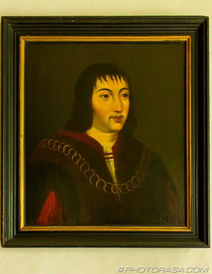 painting of unknown man wearing gold linked chain