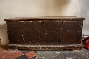 old wooden church chest with 3 keyholes