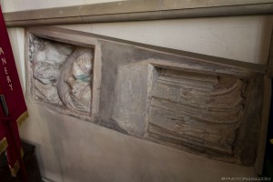 stone coffin embedded in church wall