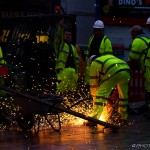 workmen making sparks fly