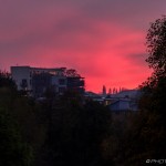 red sky over block of flats
