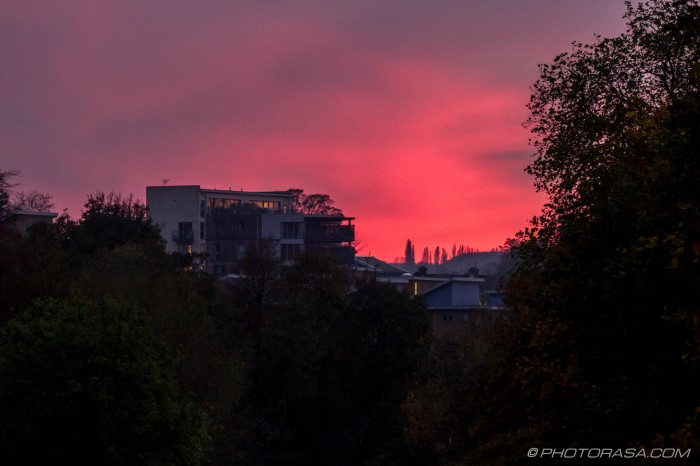 red sky over block of flats
