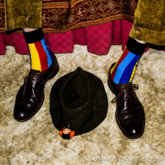 brogues, colorful stripey socks and a hat