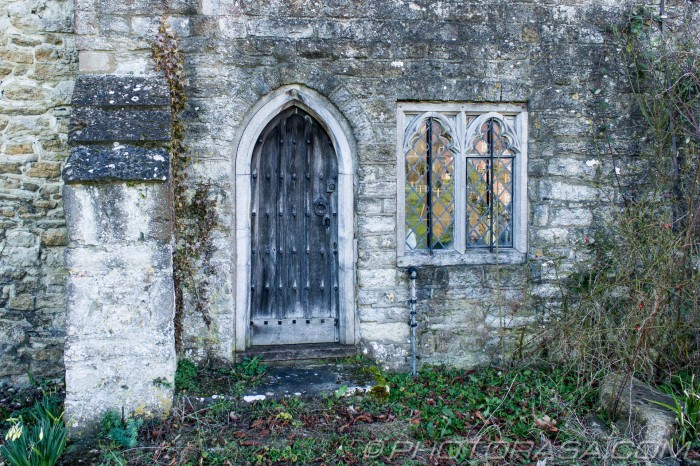 old wooden arched side door