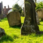 damaged and split stone grave
