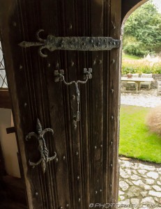 wooden back door with metal fixtures