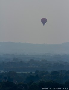 hot air ballon of misty countryside