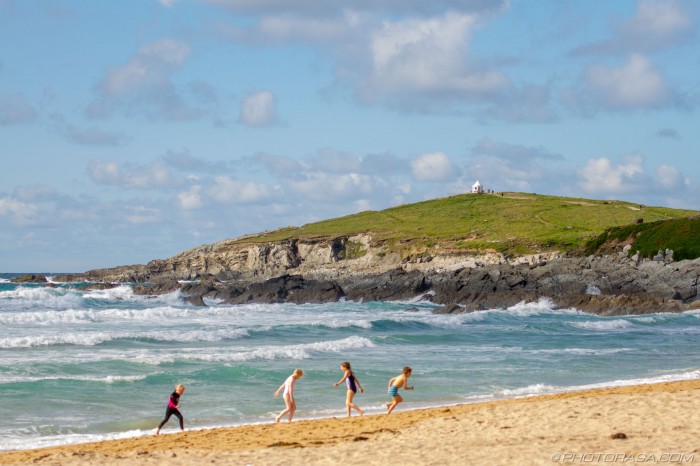 children playing on fistral beach