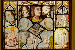 stained glass patchwork of people and faces