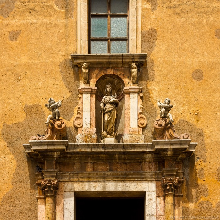 statues above building entrance